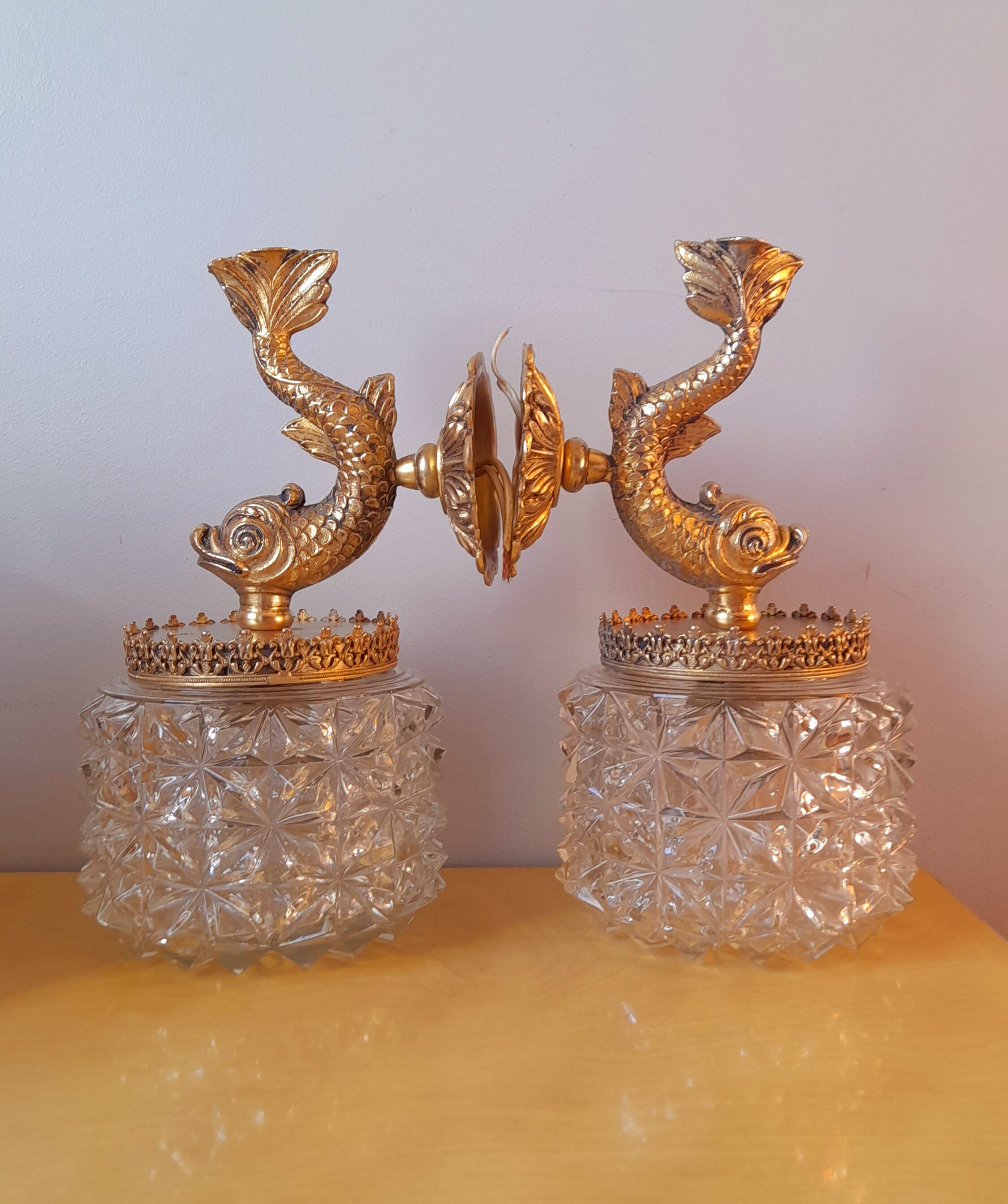 Pair of dolphin brass sconces