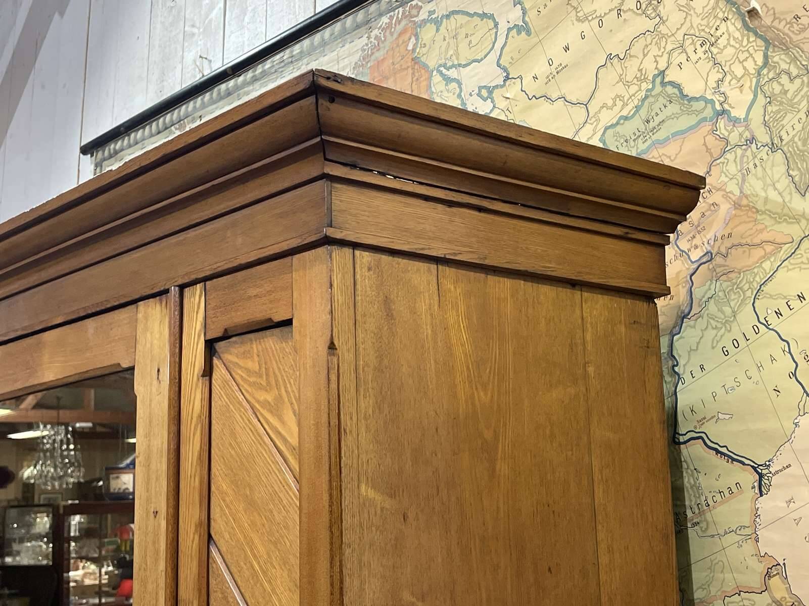 English oak wardrobe from the early 20th century.
