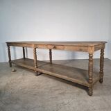Beautiful 19th-century draper's table in oak with six fluted legs.
