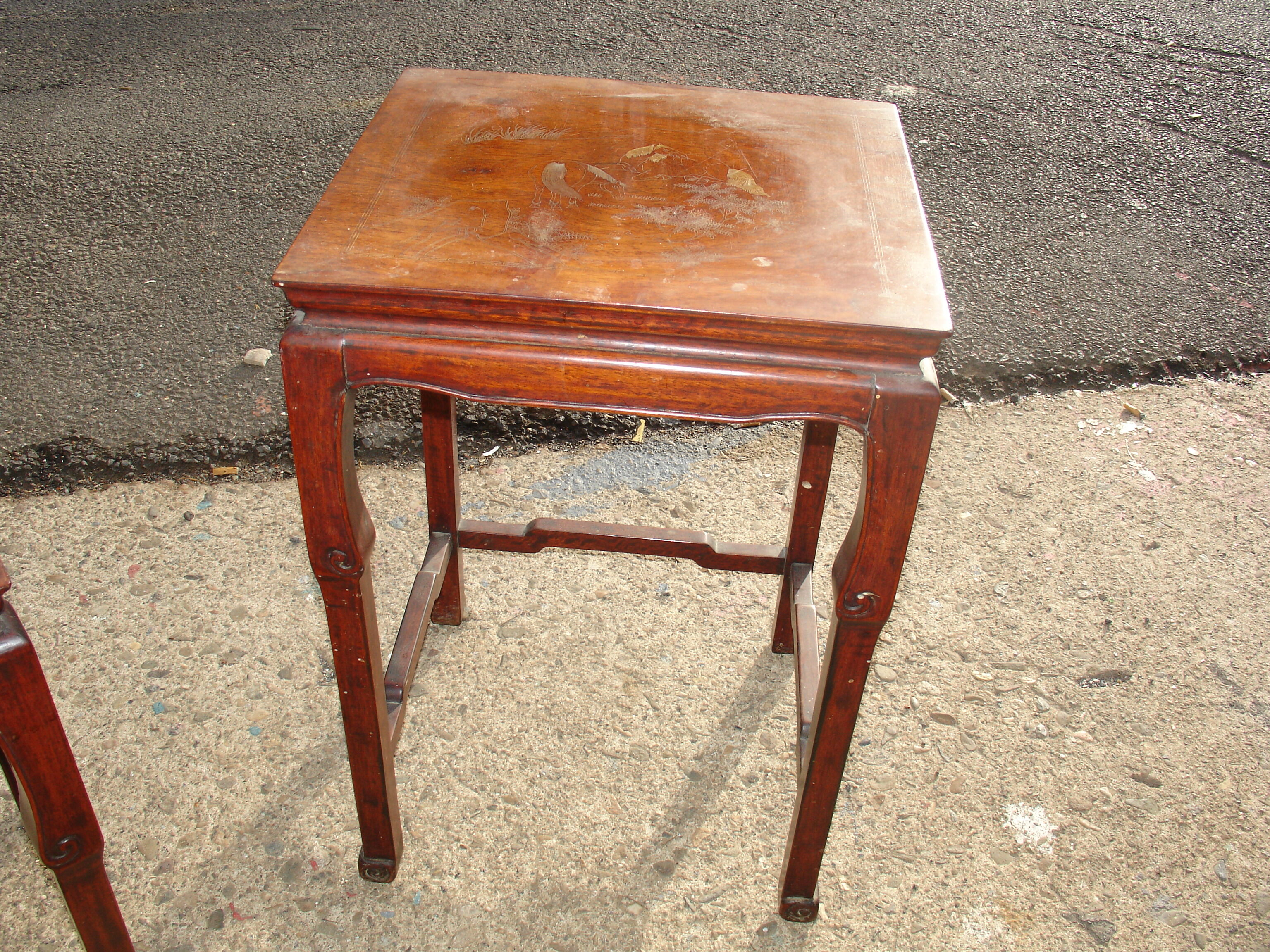 Nesting tables in ironwood with engraved decoration and gold highlights
