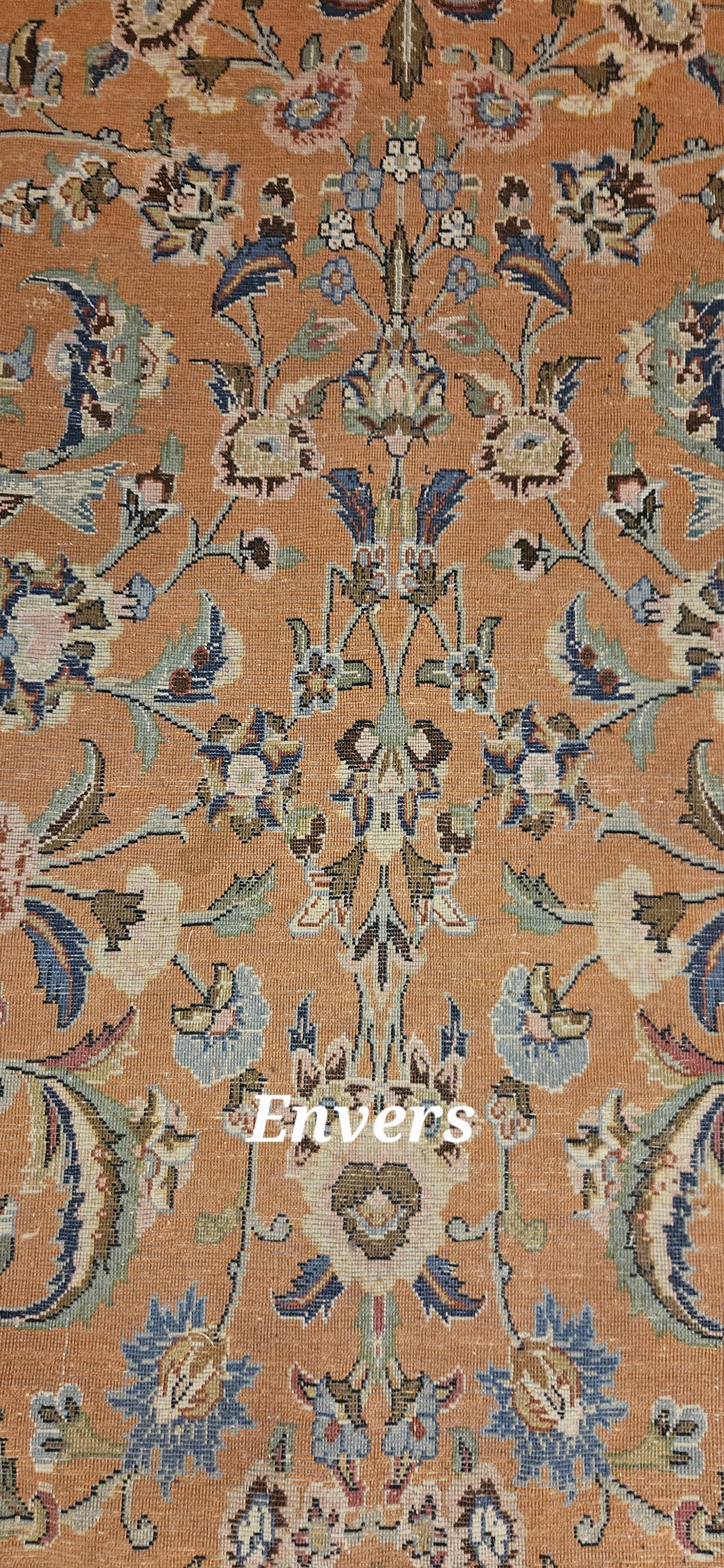 Large wool and silk oriental carpet