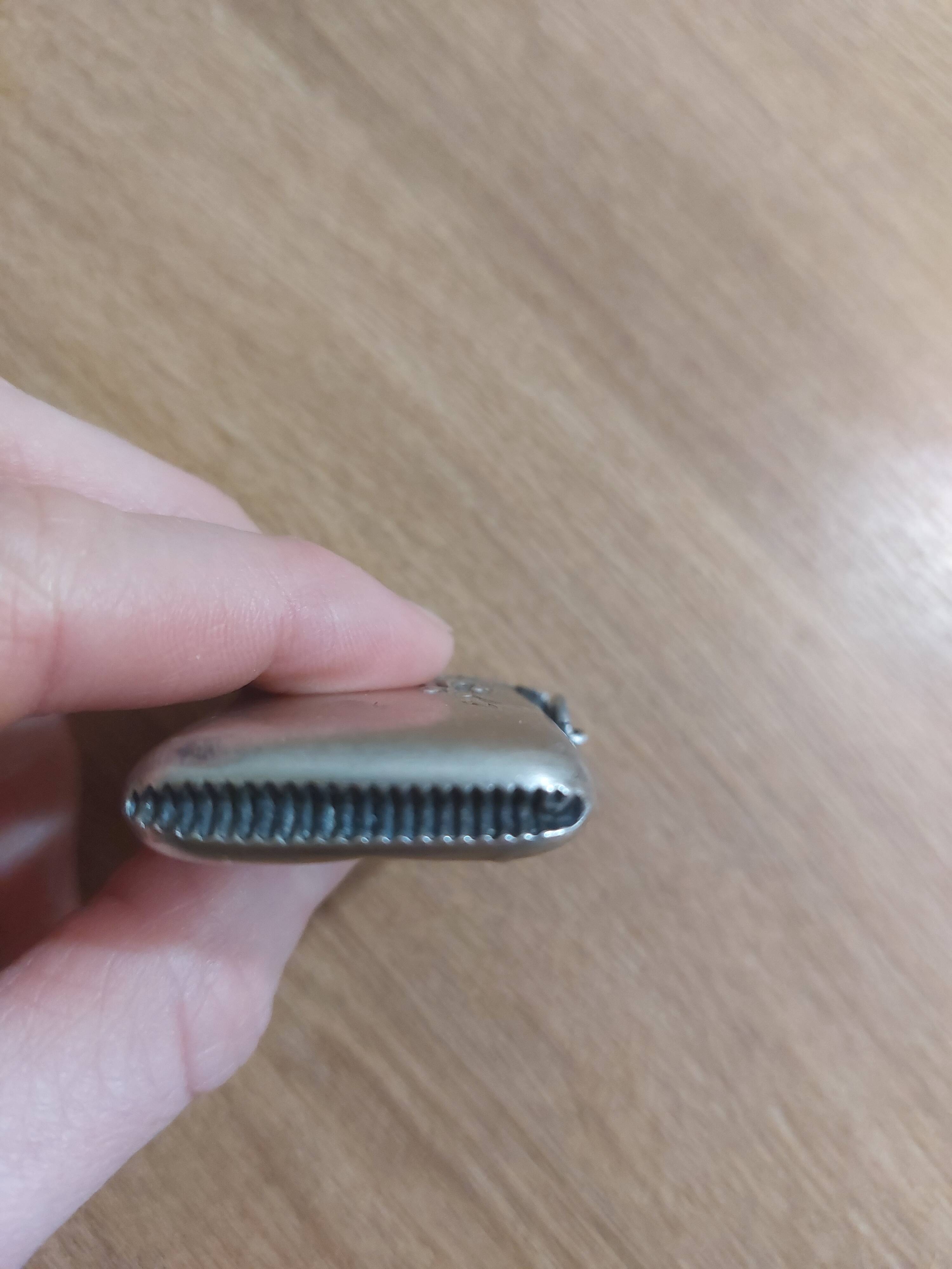 Antique match holder with striker in silver