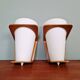 Pair of Philips teak and opaline wall lights, designed by Louis Kalff, 1950