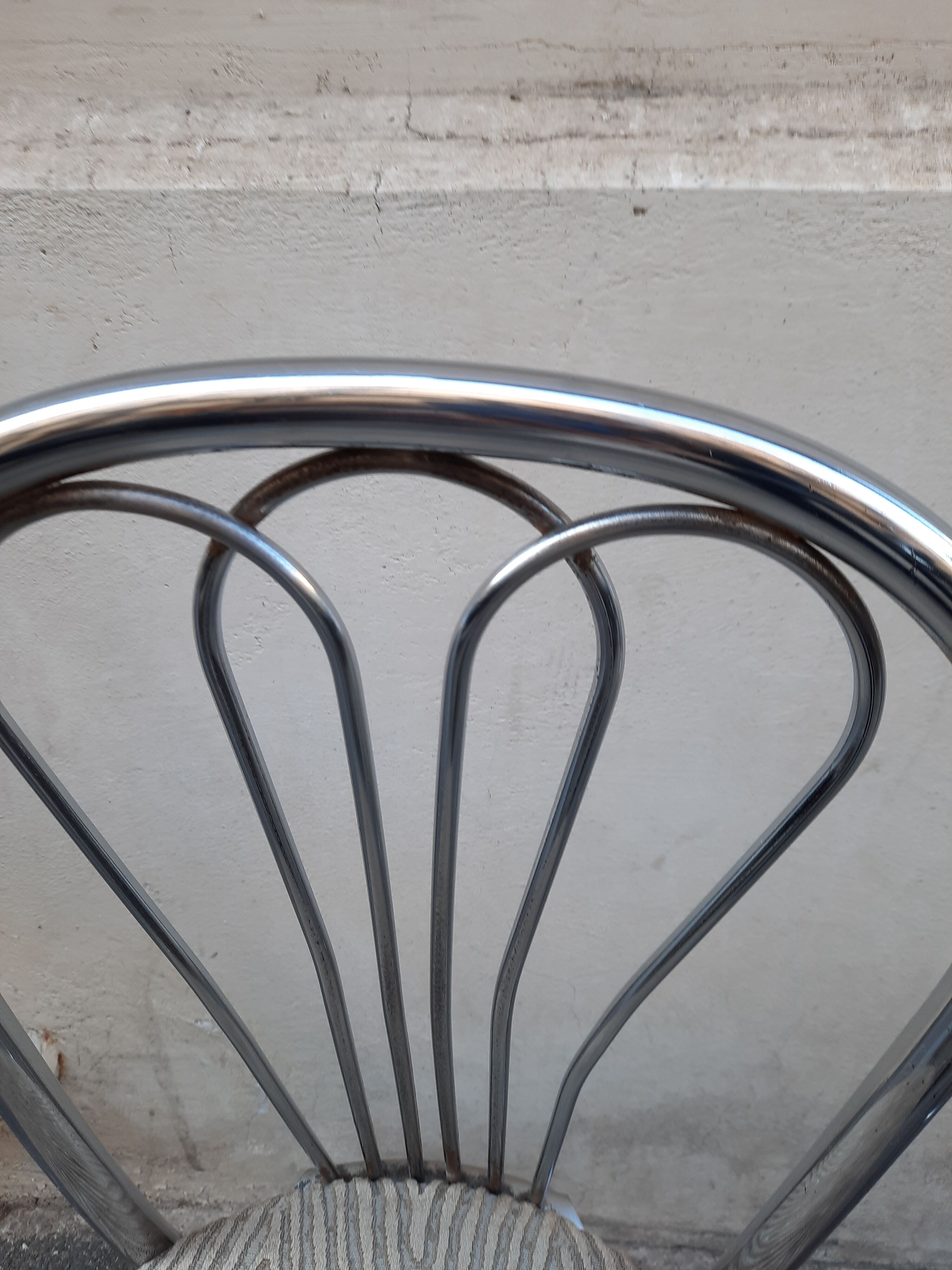 Pair of tubular metal bistro chairs