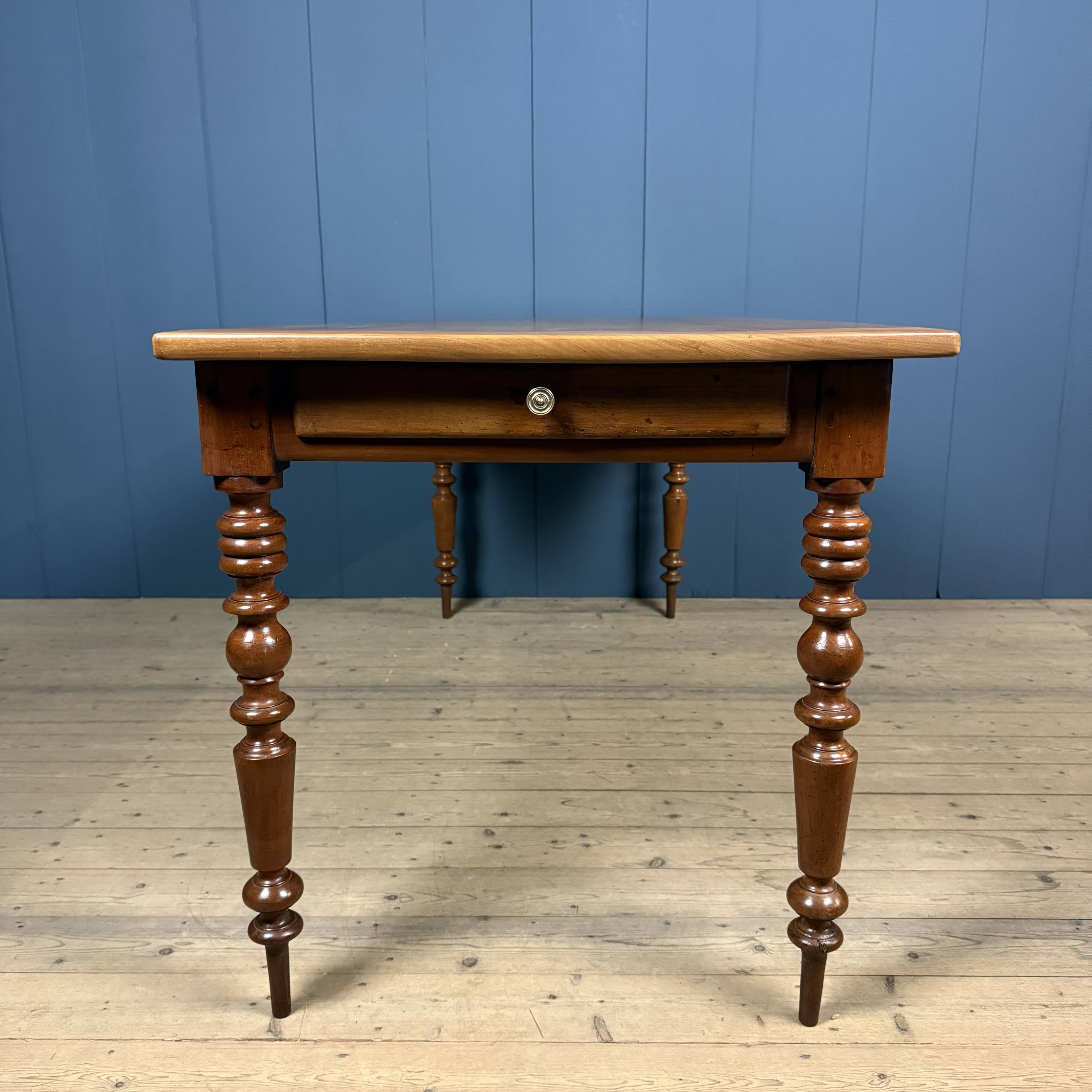 Antique cherry wood dining table from France.
