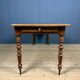 Antique cherry wood dining table from France.
