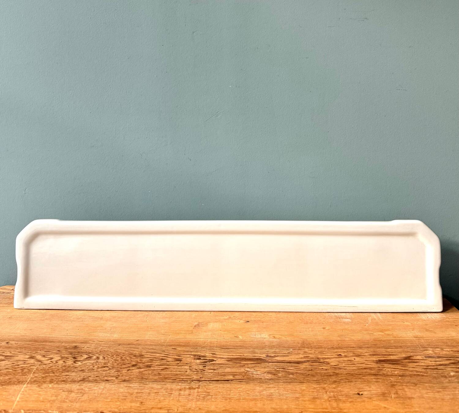 Large Art Deco wall shelf in white porcelain