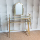 Dressing table in gold metal