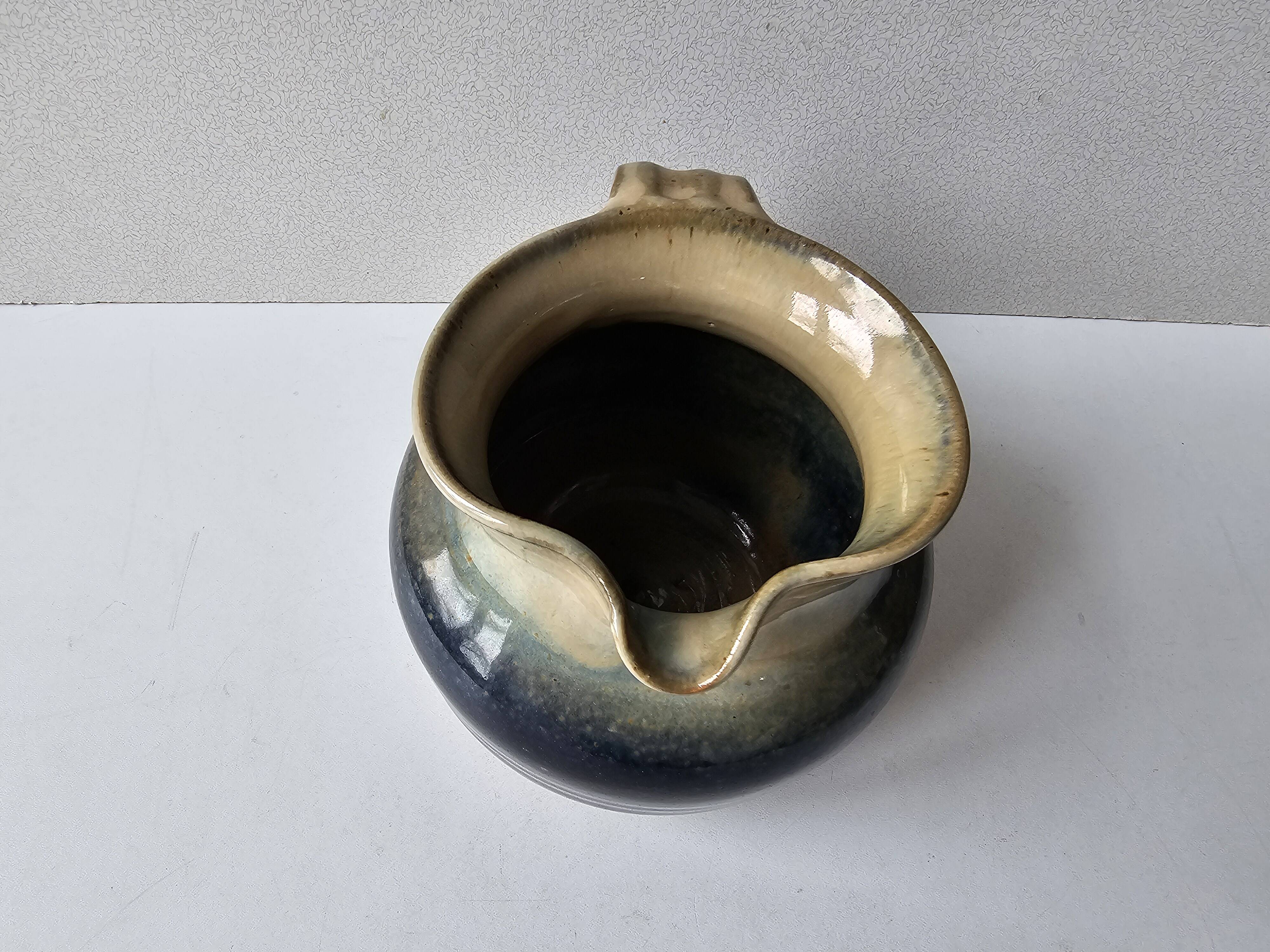 Glazed ceramic pitcher signed C - Tasey