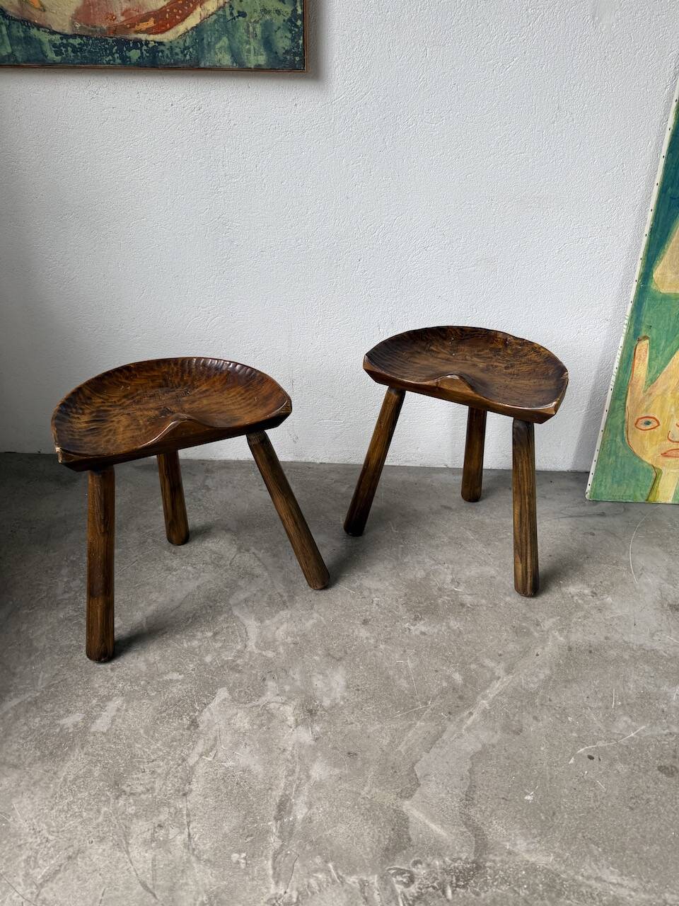 Pair of Le Selou tripod shepherd's stools