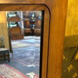 Art deco mirror in carved walnut