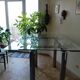 High table with tempered glass and chrome base.