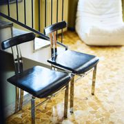 Pair of vintage Italian made dining chairs in chromed metal and black leather