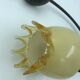 Decorative glass and metal wall light