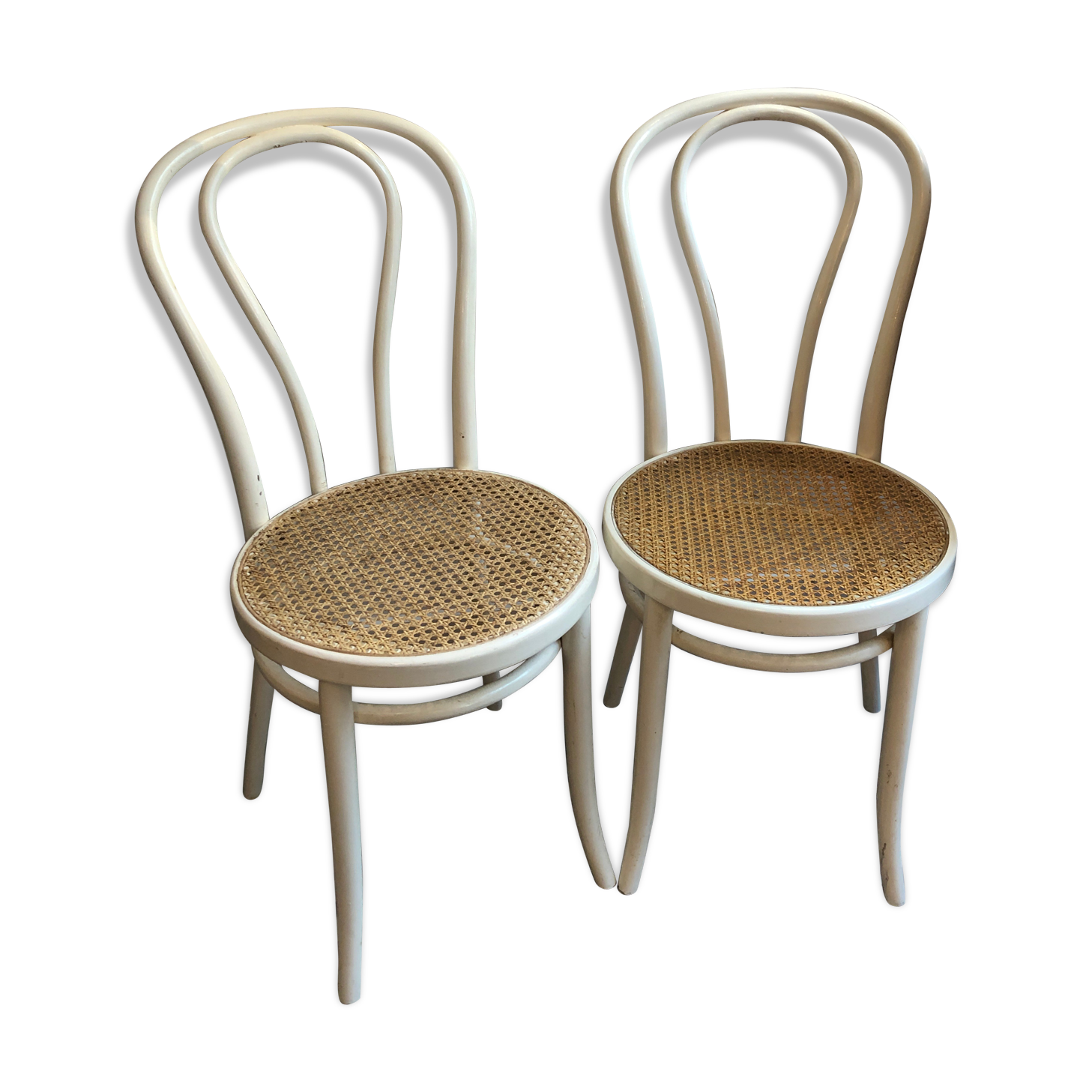 Couple of white bistro chairs