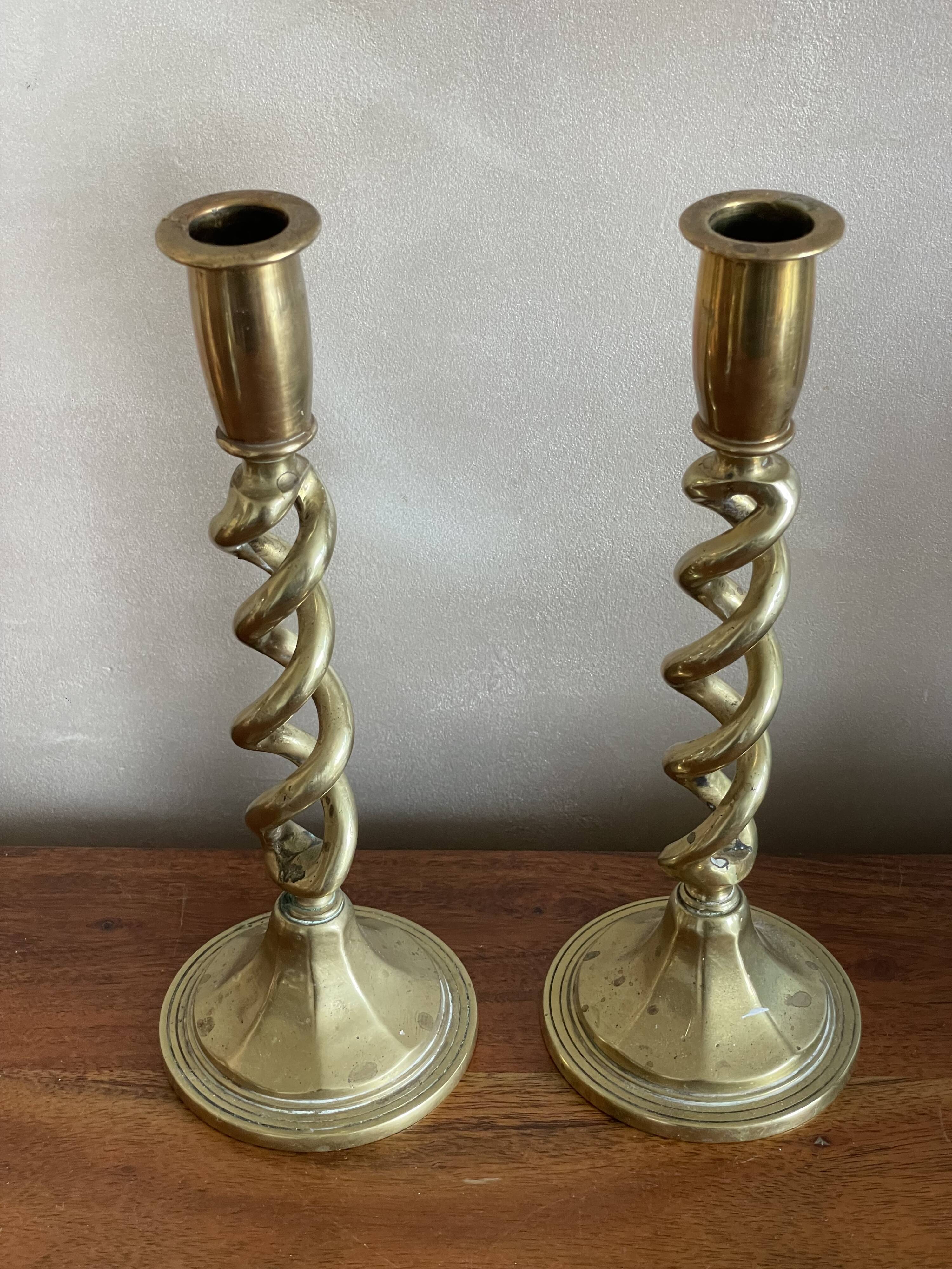 Duo of twisted brass candle holders