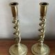 Duo of twisted brass candle holders
