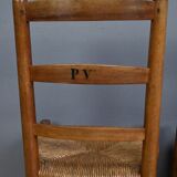 Set of 4 rush-seated chairs in cherry wood – late 19th century