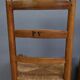 Set of 4 rush-seated chairs in cherry wood – late 19th century
