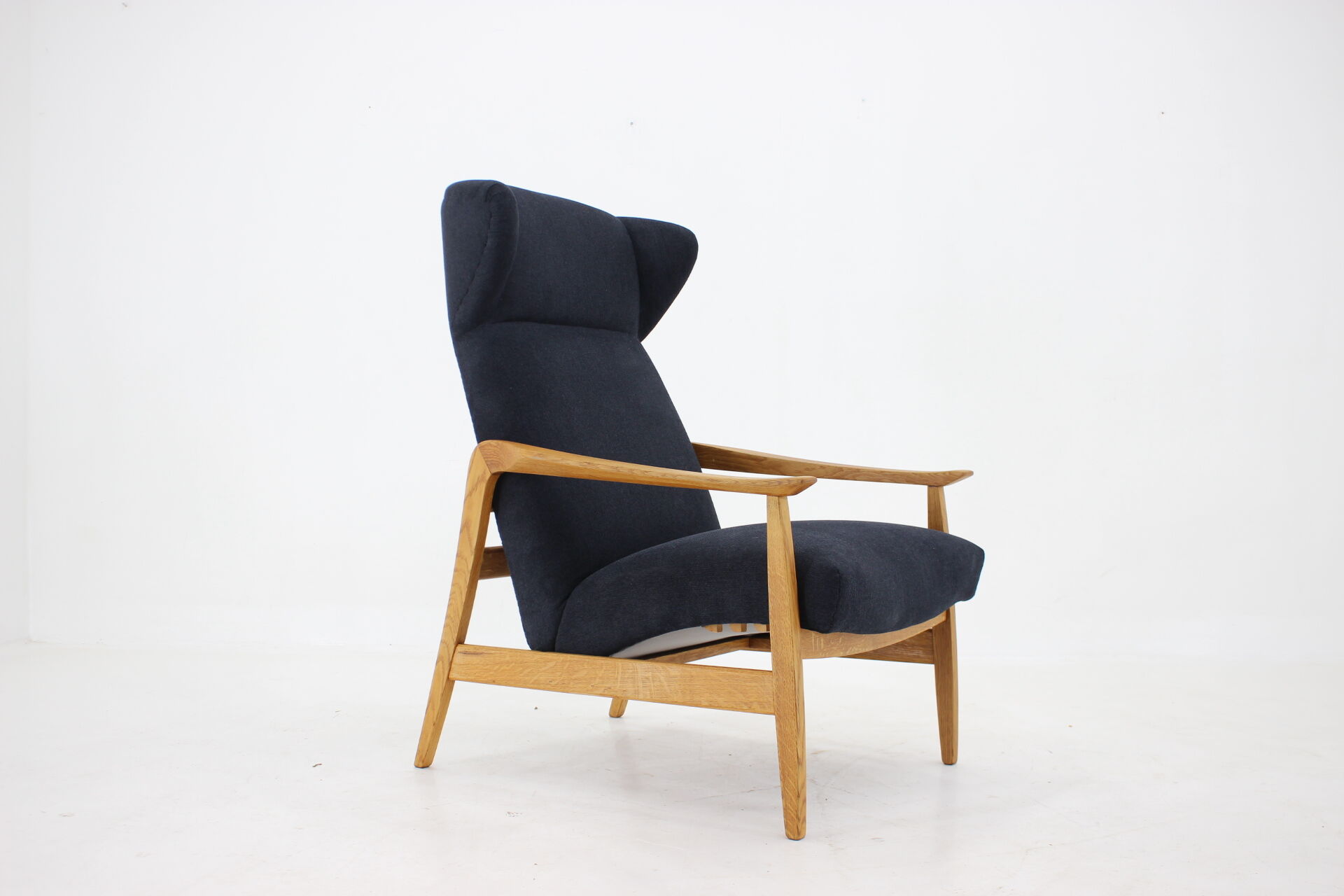 Oak reclining wing chair, czechoslovakia, 1960