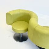 Yellow green space age bench with wavy design