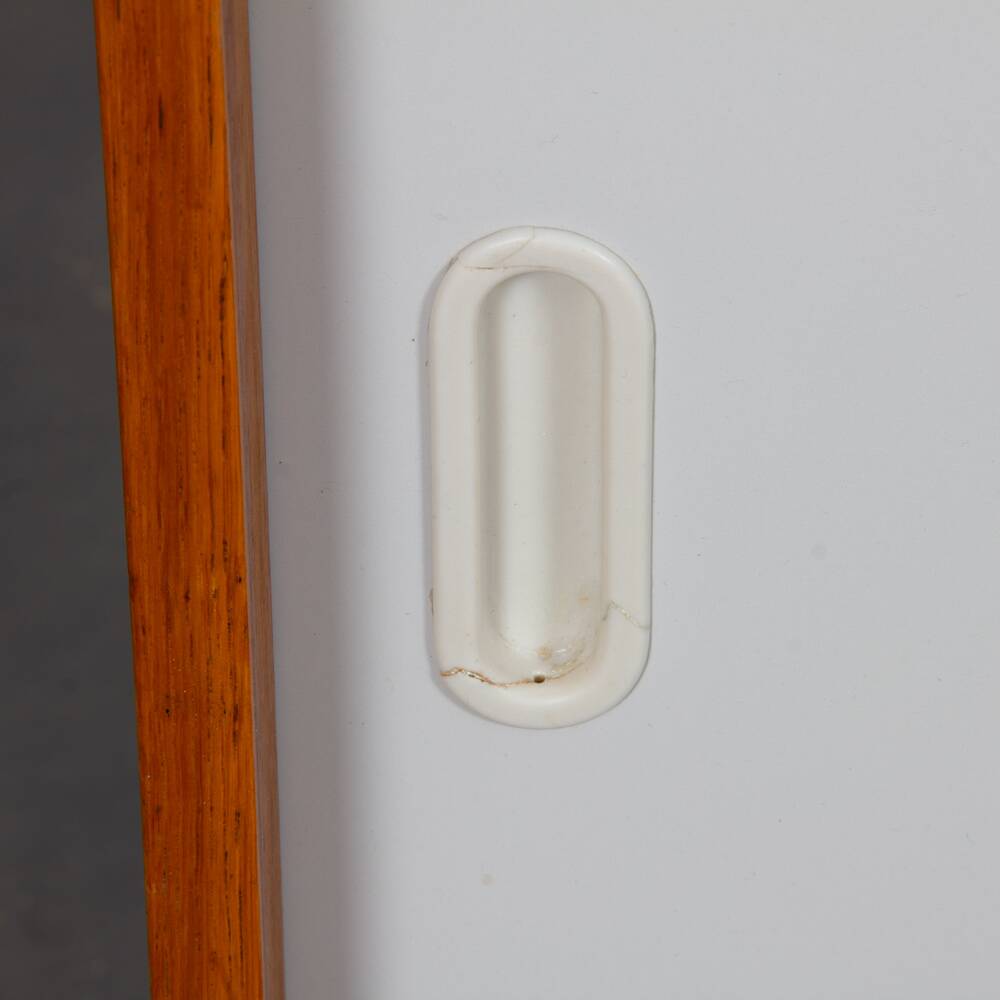 Pink and white chest of drawers by Jiri Jiroutek, model U-452 circa 1960