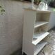 Vintage library enhanced in beige, wooden top.