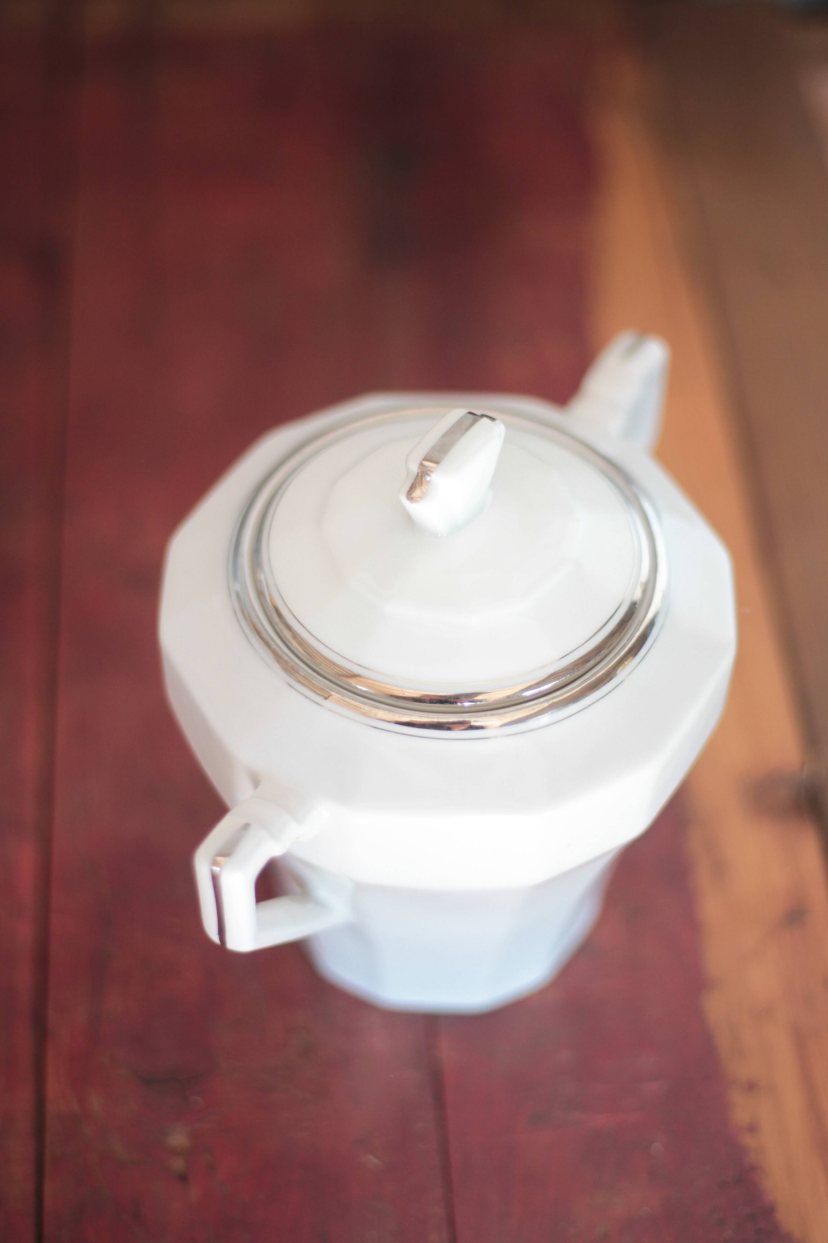 Art Deco porcelain teapot and its sugar bowl, porcelain coffee pot, kitchen.