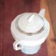 Art Deco porcelain teapot and its sugar bowl, porcelain coffee pot, kitchen.
