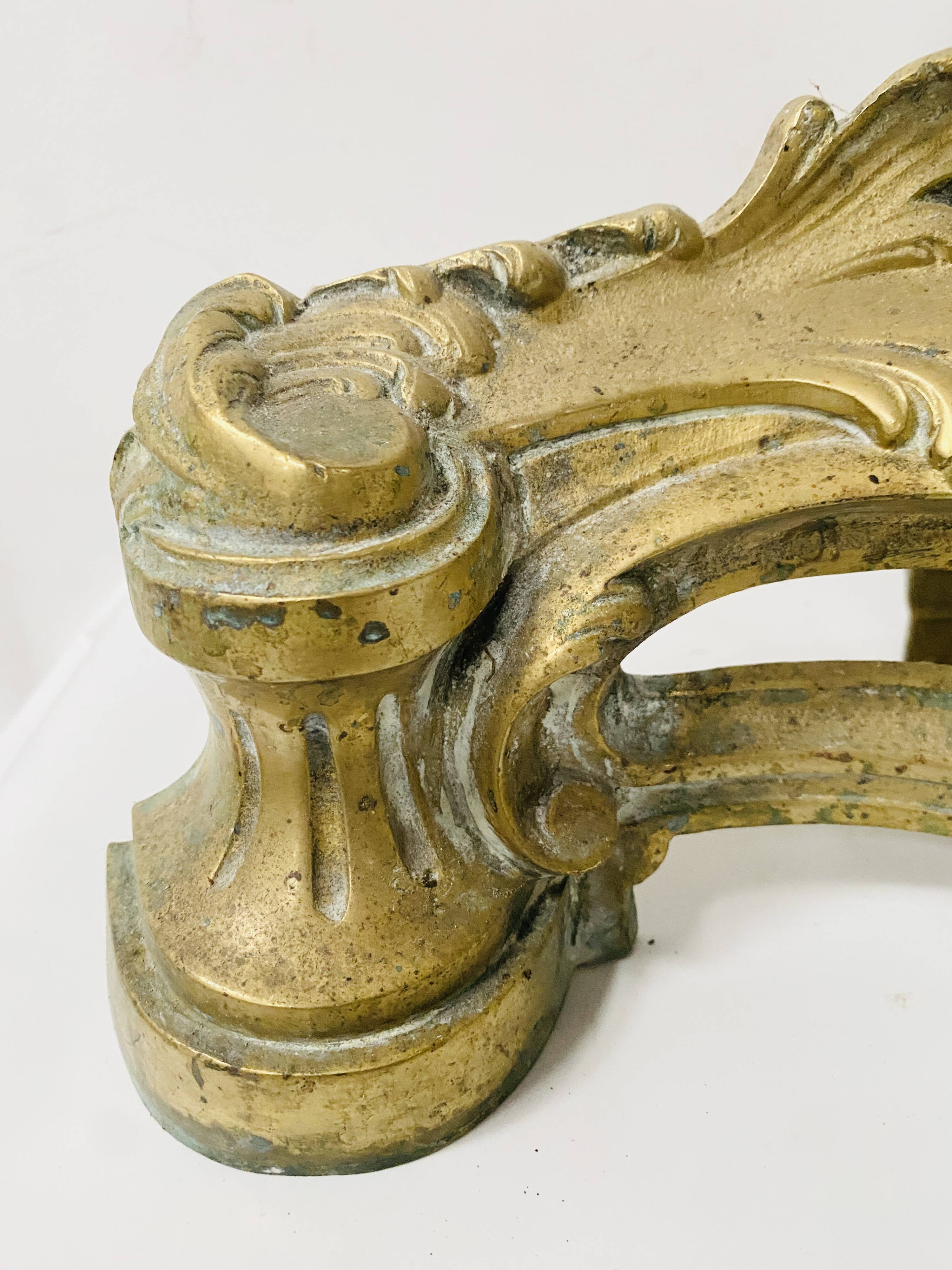 Louis XV style chiseled bronze firedog, 20th century