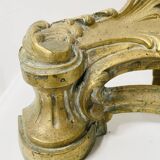 Louis XV style chiseled bronze firedog, 20th century