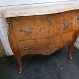 Louis XV style curved chest of drawers in marquetry