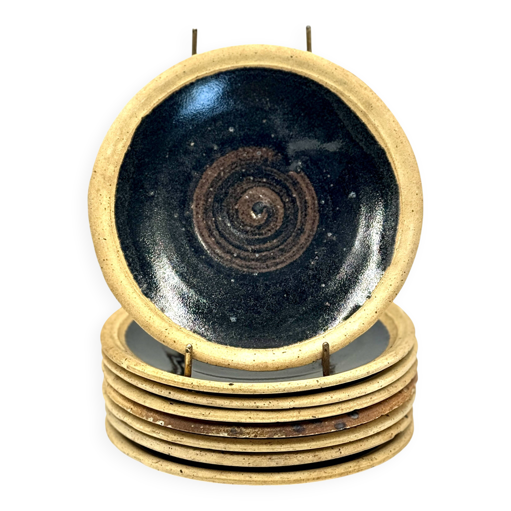 Pierre Digan 8 black stoneware plates from the 70s