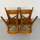 Set of 4 vintage solid oak chairs, 1960s design with sculpted backrest.