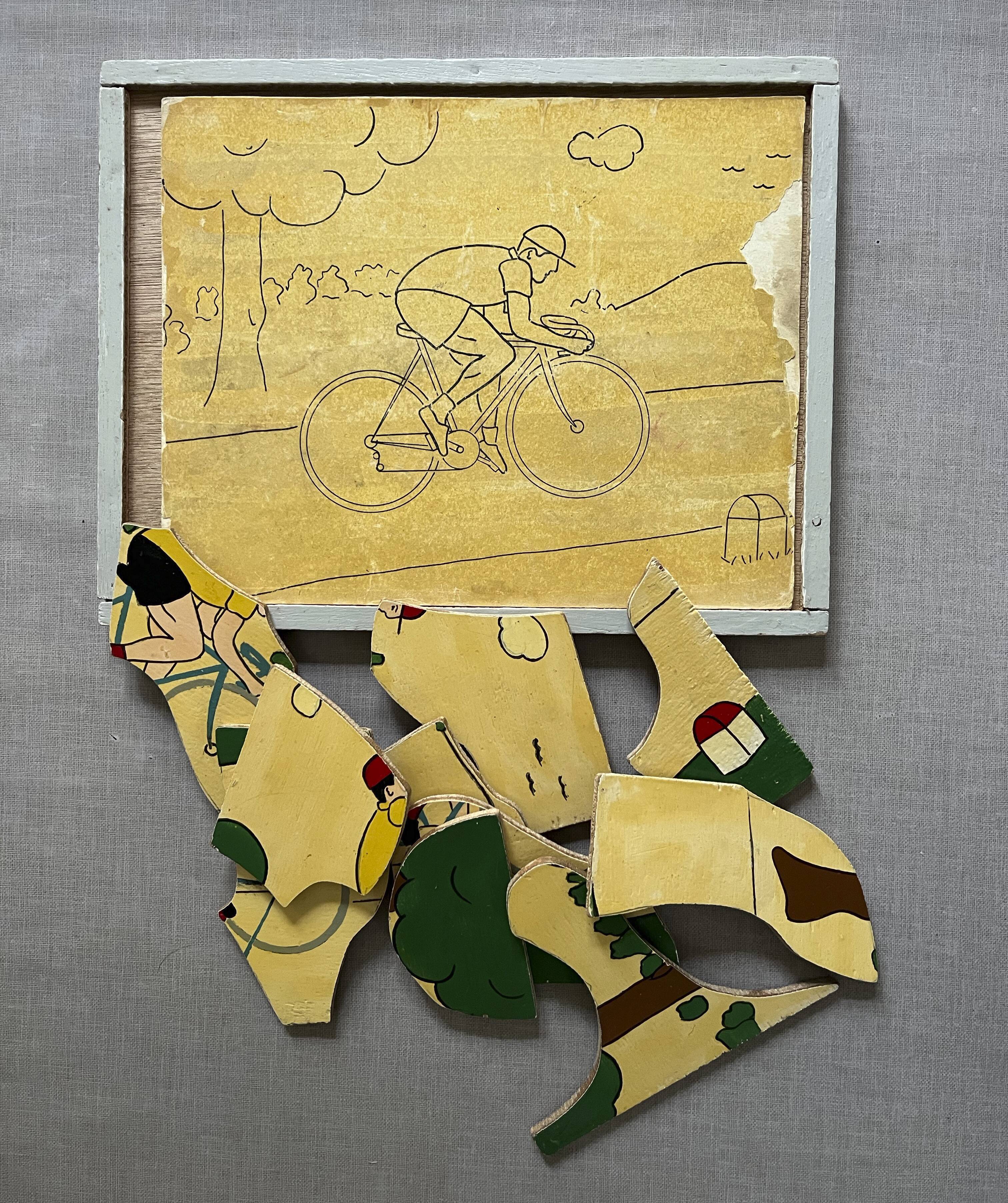 Wooden puzzle frame from the 30s/40s depicting a cyclist