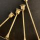 4 Scandinavian brass candle holders