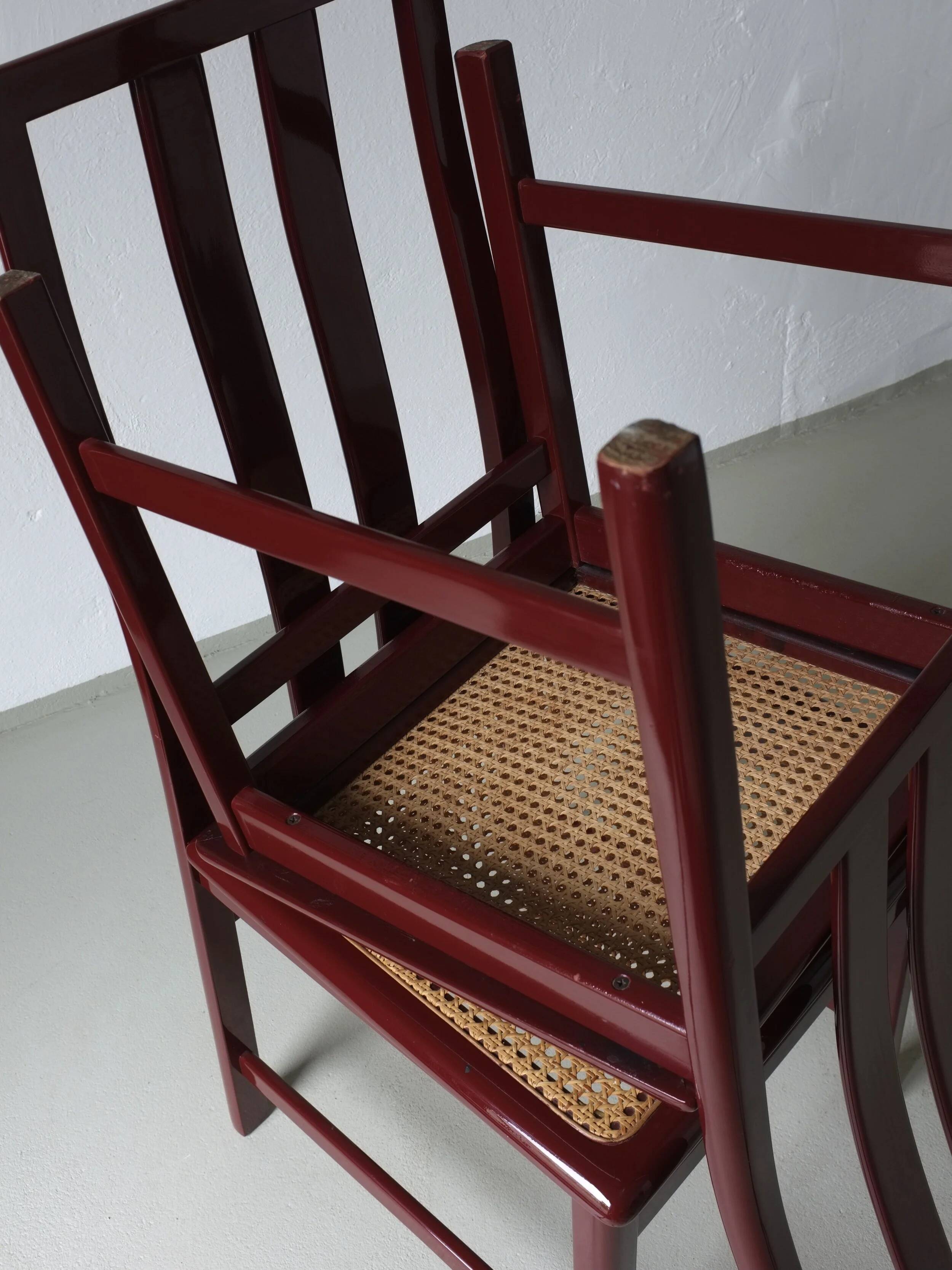 4 Glossy wine red cane seat chairs | Italy | 1970s