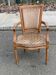 Solid wood and velvet armchair in Louis XVI style