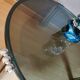 Table basse verre fumé et pieds chromés
