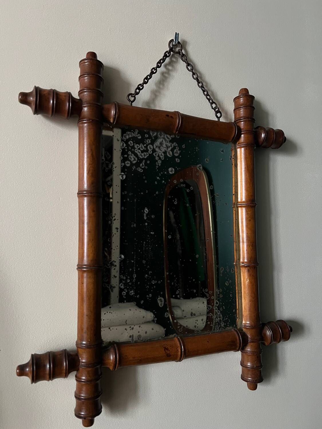 Small old turned wood mirror with bamboo effect