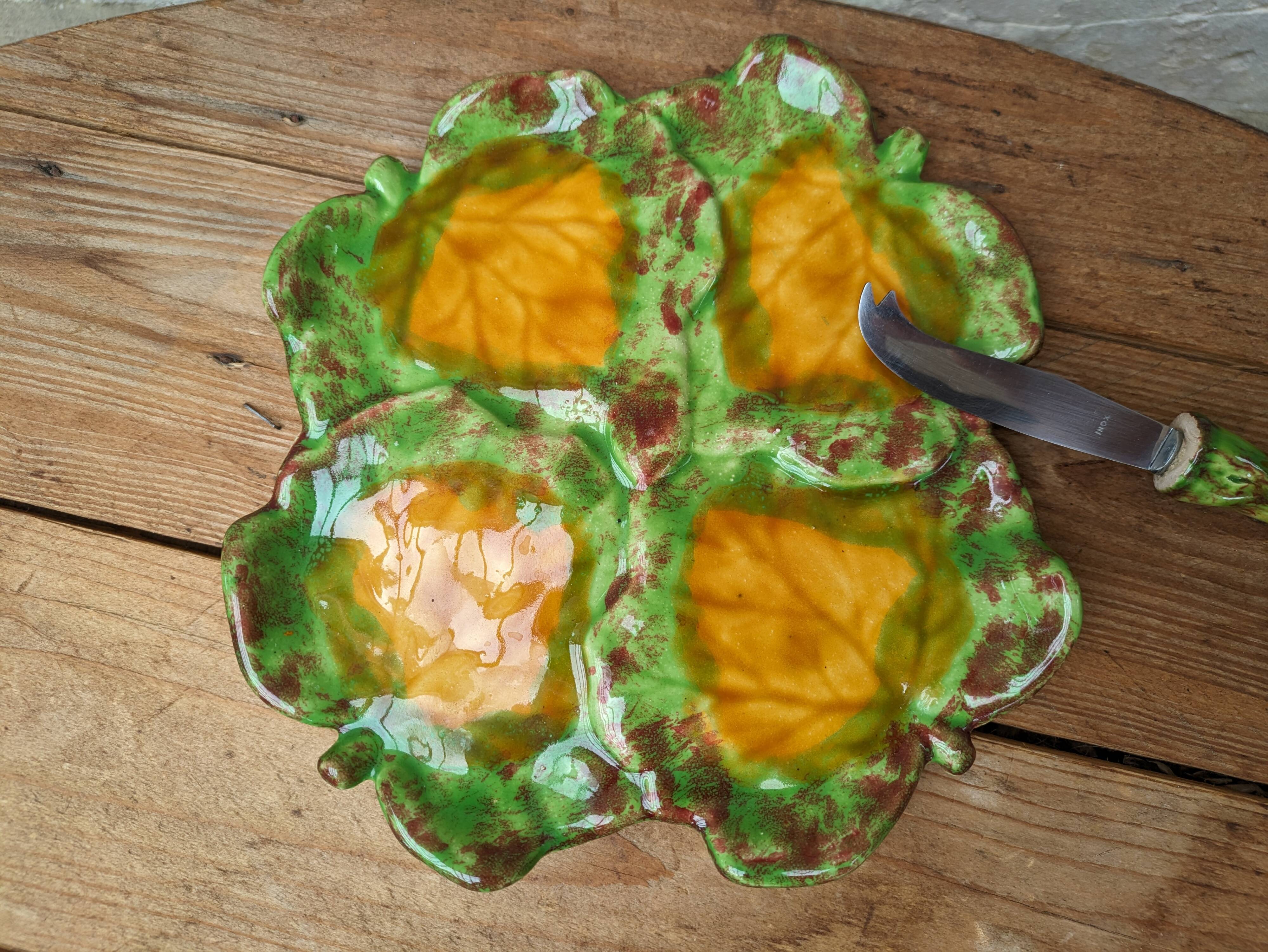 Antique colored ceramic cheese plate with knife