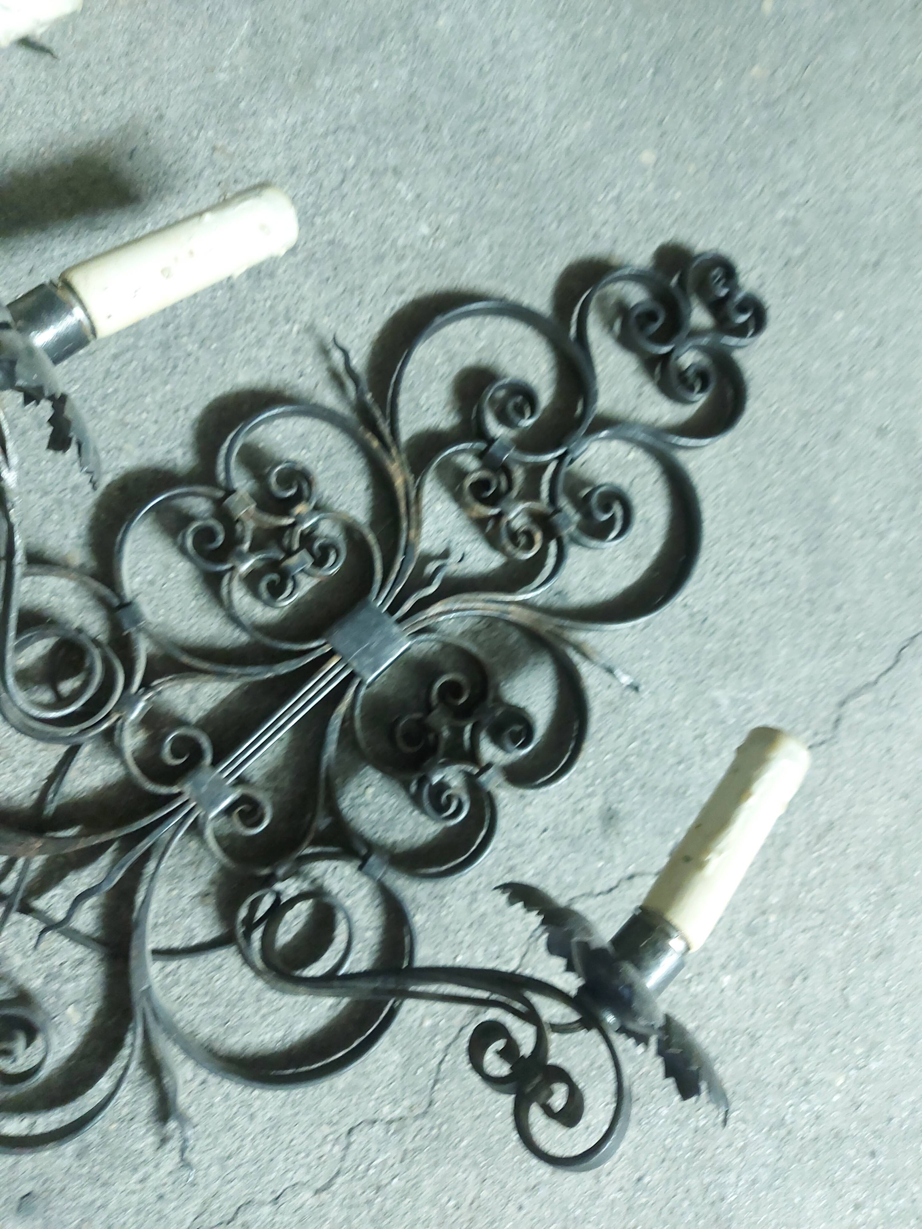 Two large wrought iron wall lights