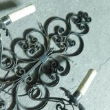 Two large wrought iron wall lights