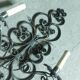 Two large wrought iron wall lights