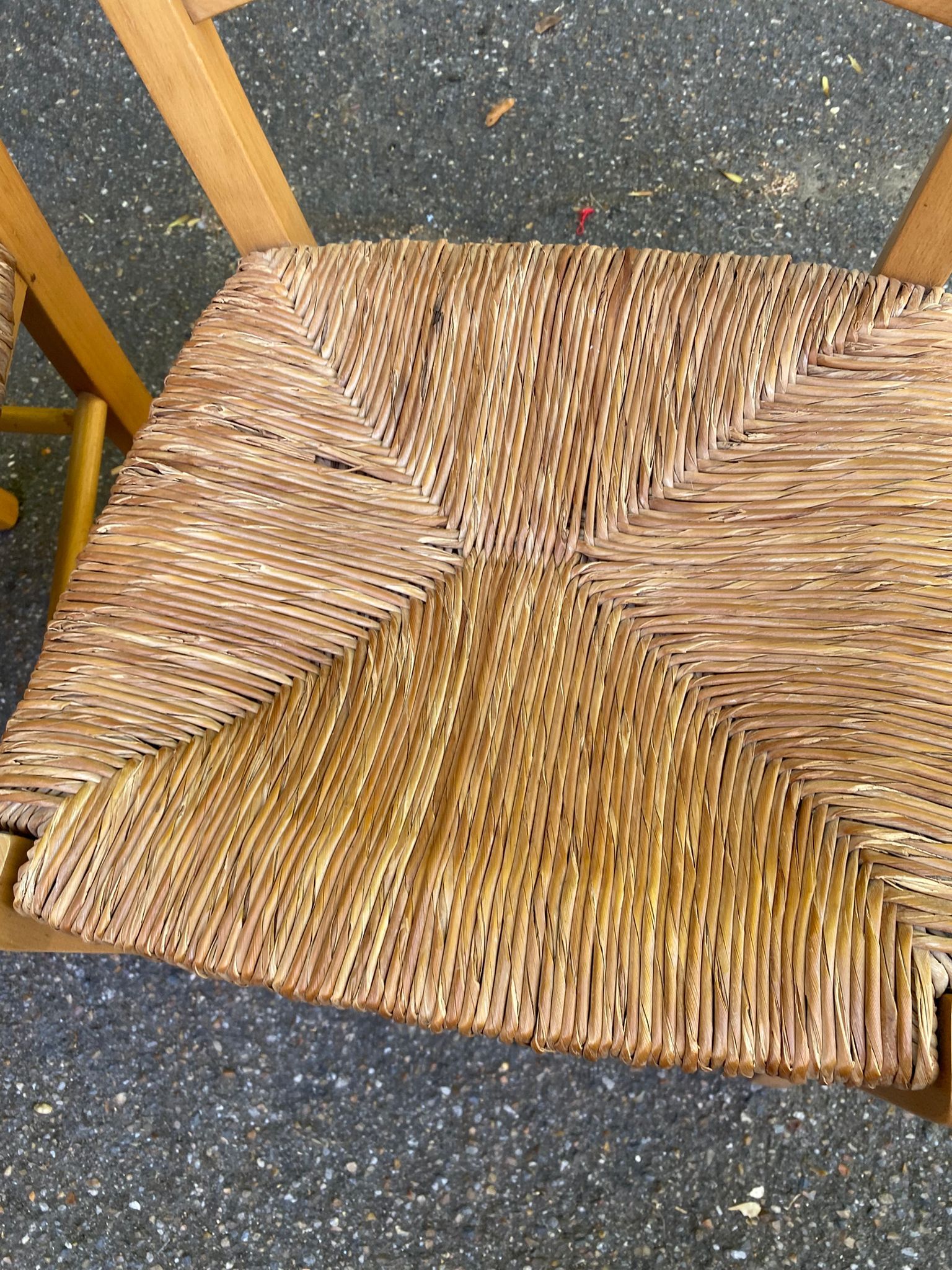2 solid wood kitchen chairs with straw in a country style