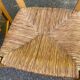 2 solid wood kitchen chairs with straw in a country style
