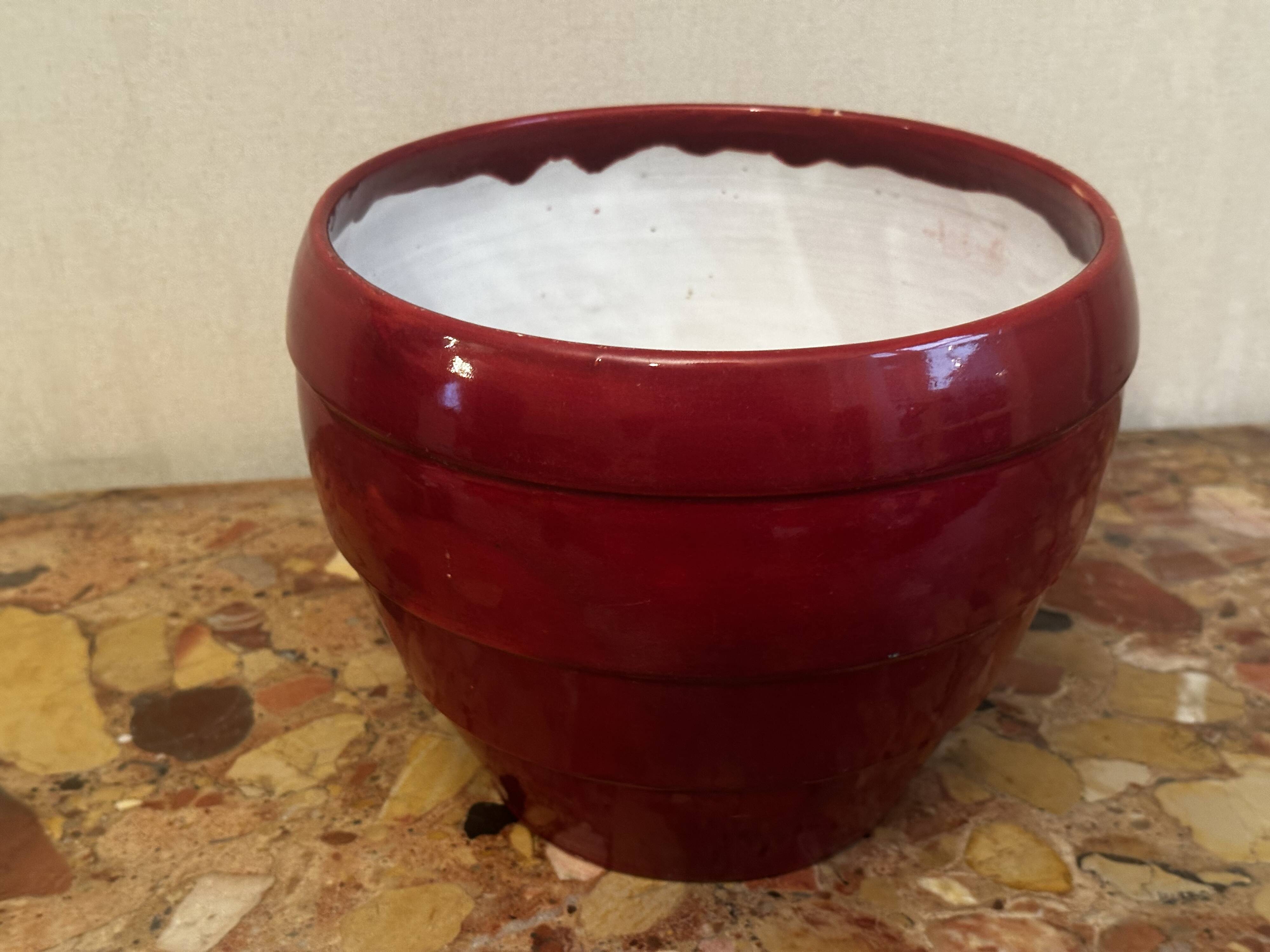 Burgundy glazed ceramic planter