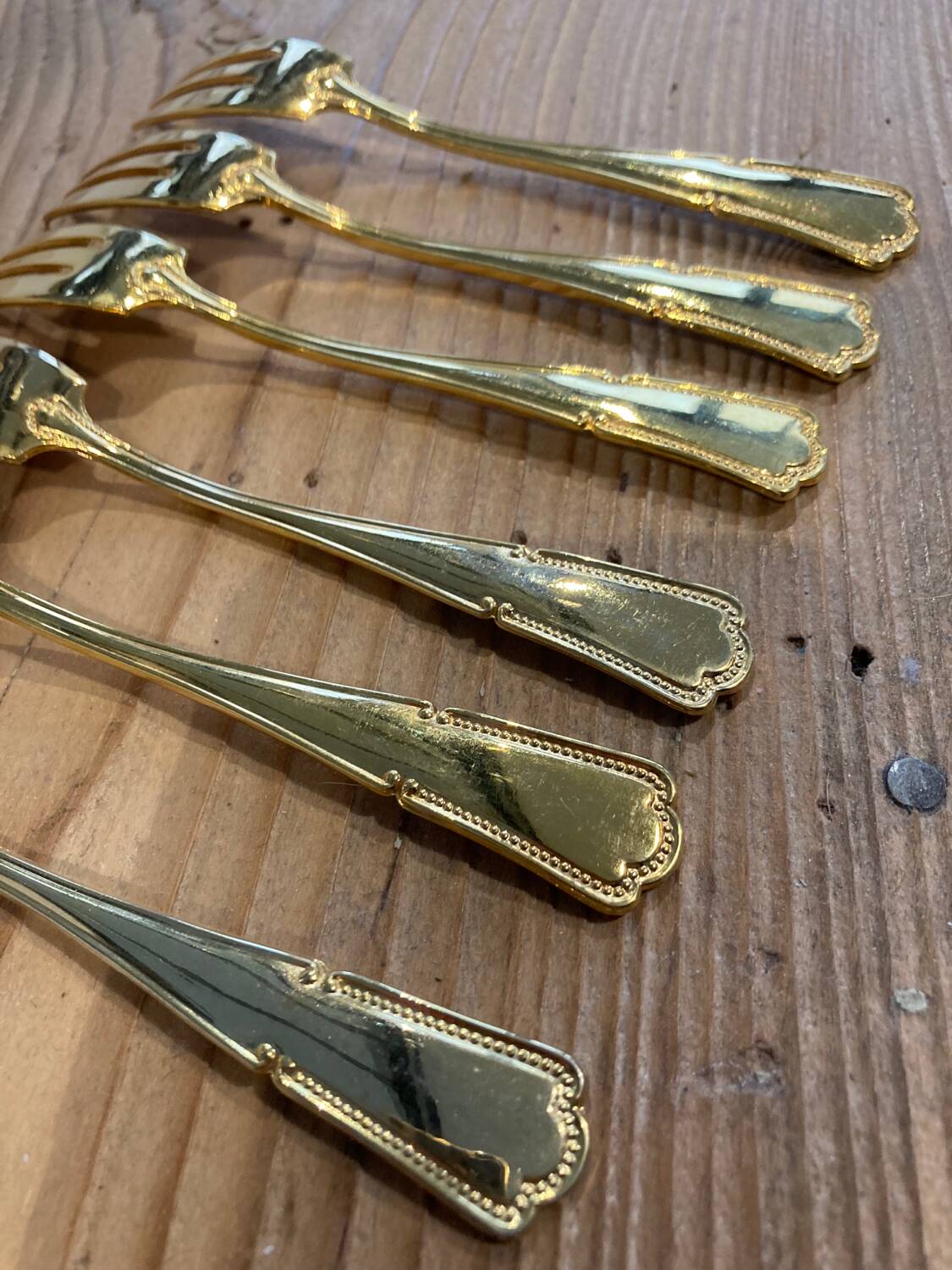 Set of 6 golden dessert forks