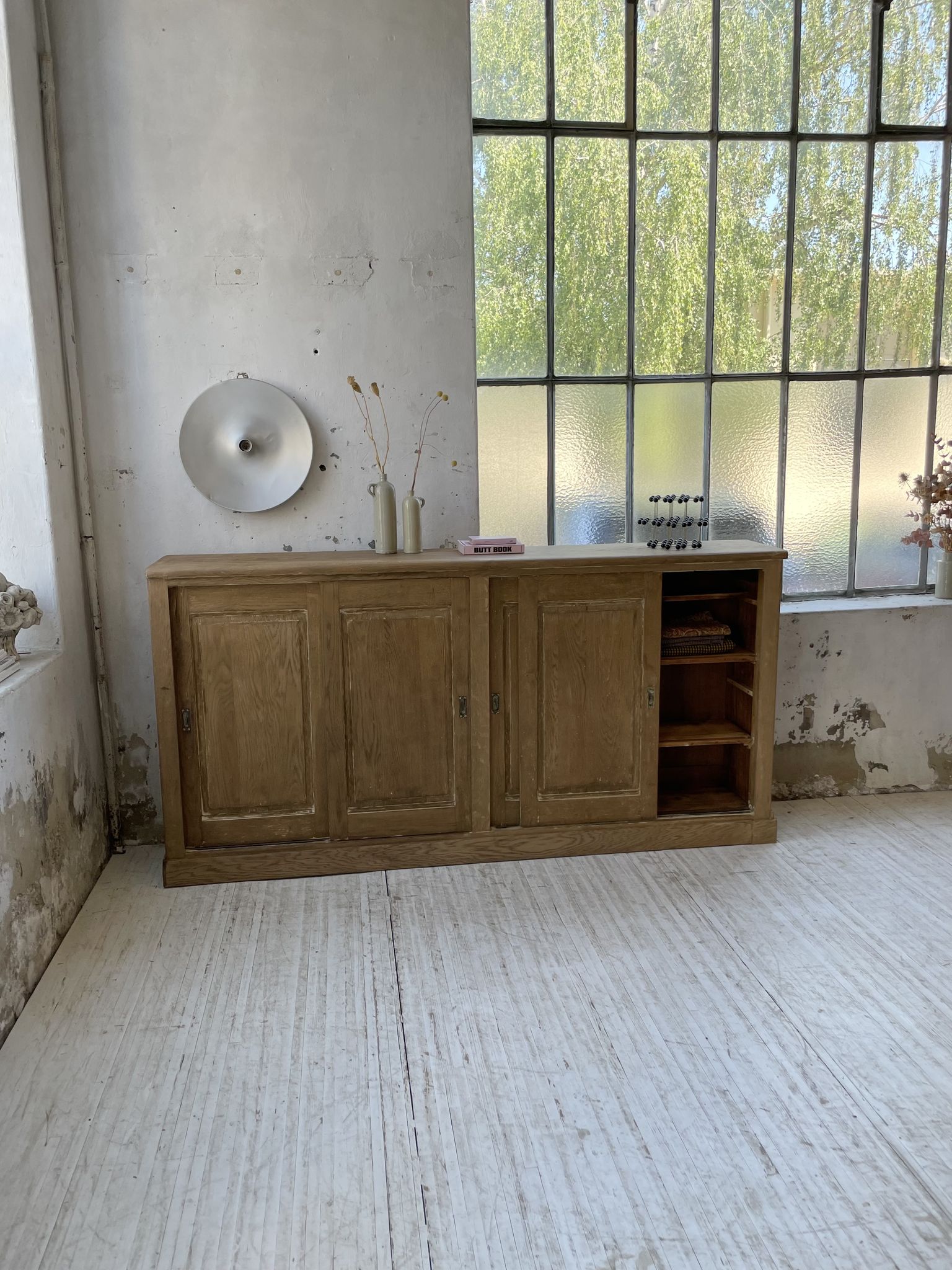 Large row of solid oak loom sliding doors