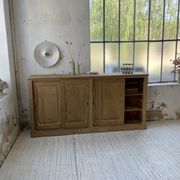 Large row of solid oak loom sliding doors